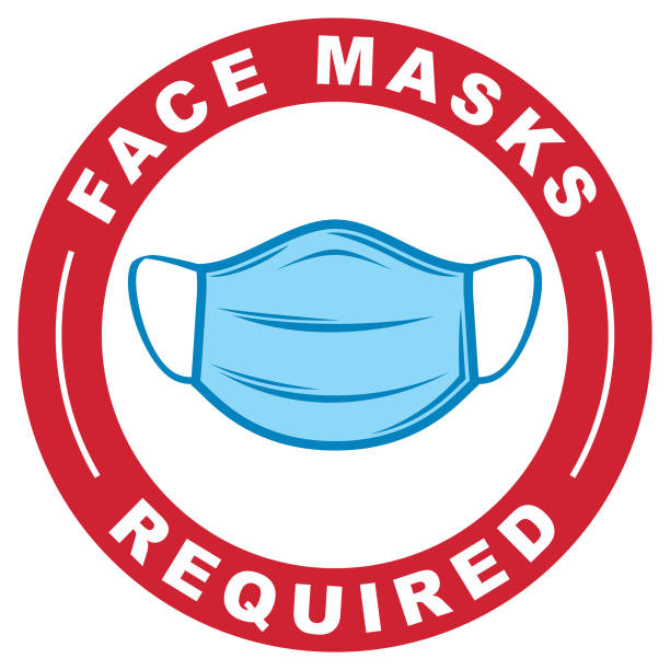 A simple vector logo of a Covid-19 protective face mask with the text Face Masks Required in a red circle